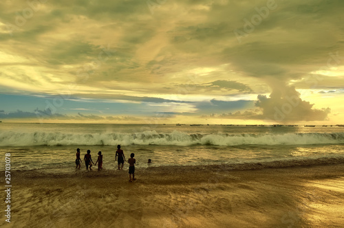 Children playing at Bali Jimbaran beach