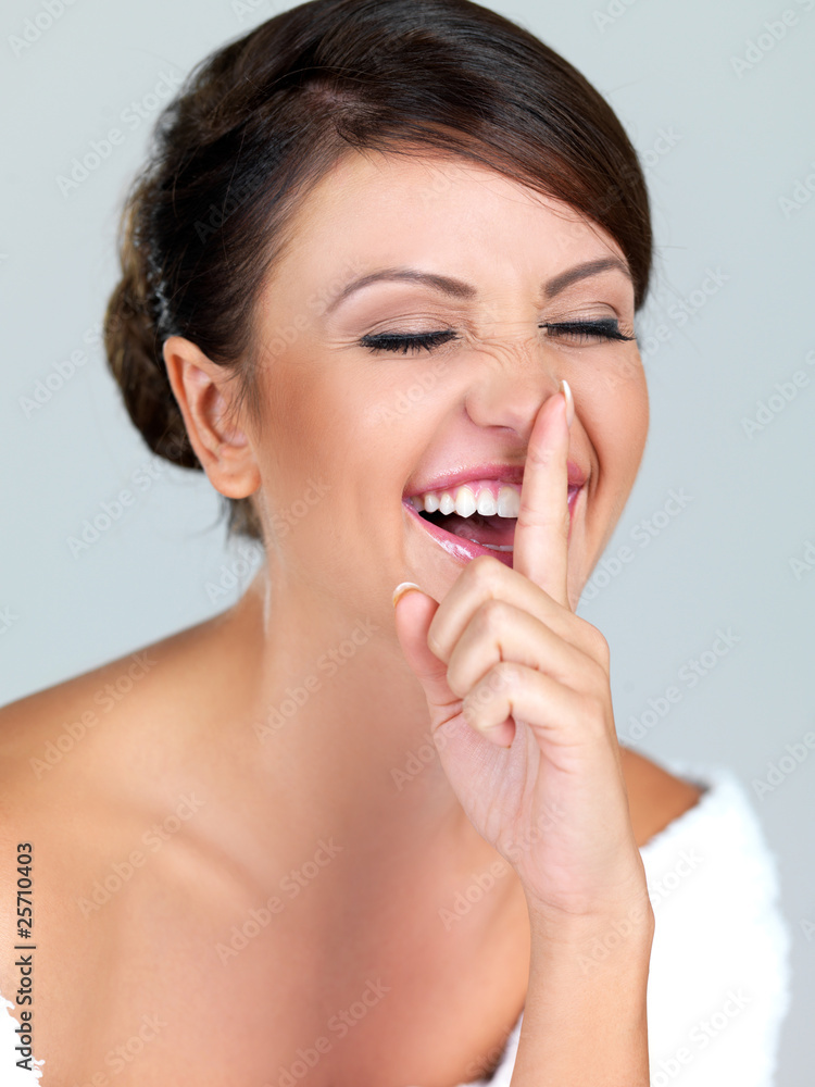 Portrait of beautiful woman, she doing quiet gesture Portrait of beautiful woman, she doing quiet gesture