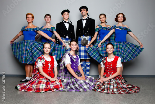 Group of dancers of the Scottish dance in kilts