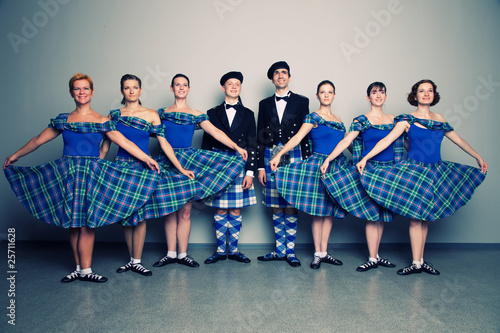 Group of dancers of the Scottish dance in kilts