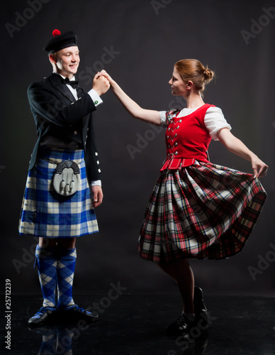 The pair dancing the Scottish dance in a kilt