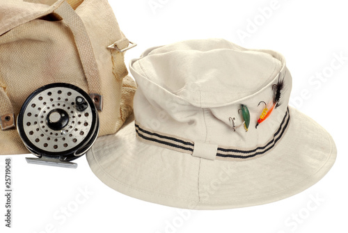 kahki hat with fly fishing equipment photo