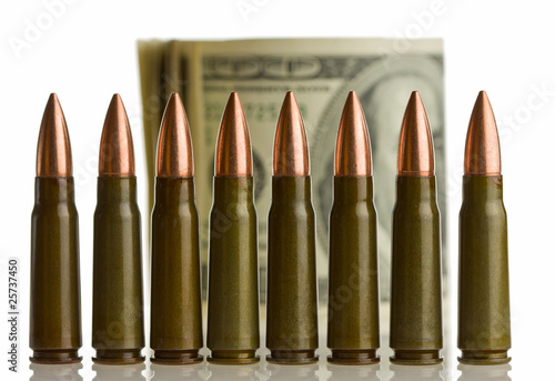 Cartridges and money - shallow DOF, focus on bullets