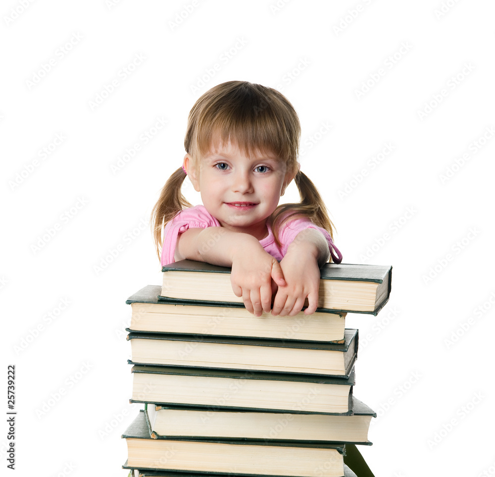Cute little girl sit near a stack of big books Cute little girl sit near a stack of big books