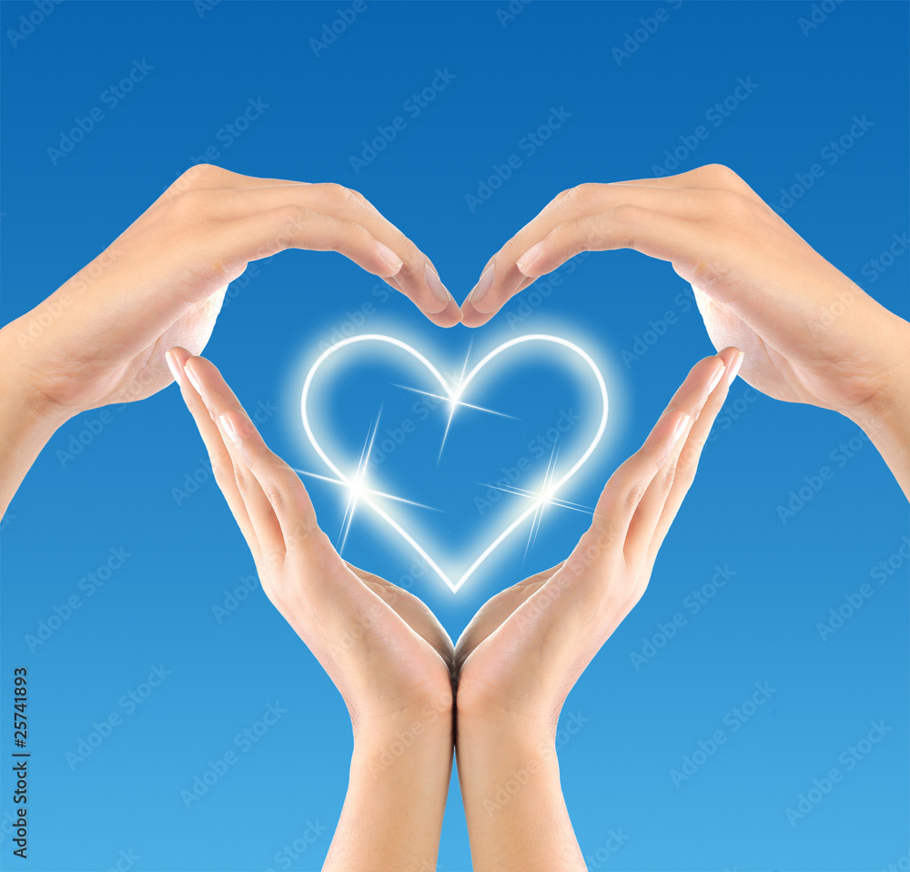 love sign by hand in blue background love sign by hand in blue background