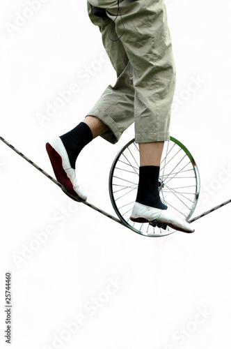 Seilakrobat, Seiltänzer, Einradfahrer auf Seil, Hochseil photo