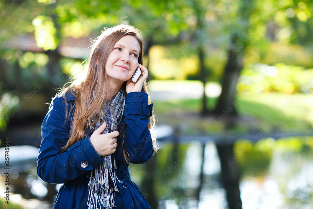 Attractive young woman with mobile phone Attractive young woman with mobile phone