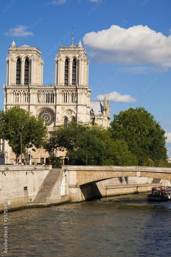 Notre Dame of Paris: West (main) facade behind the Seine