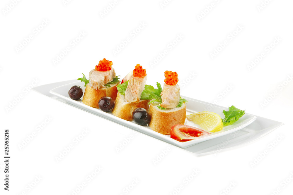 salmon chunks and caviar on baguette