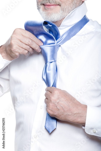 Senior man portrait tie knot lesson