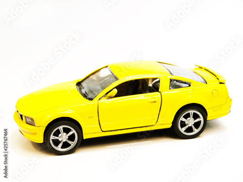 Small yellow toy sports car