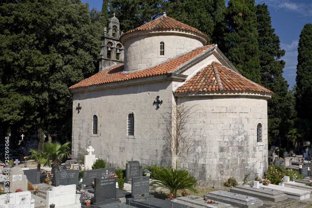 Small church on cemetery.