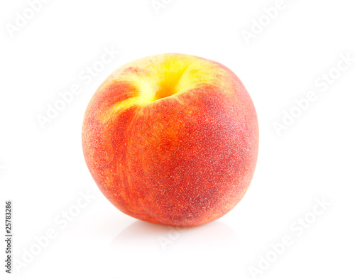 one fresh peach over white background