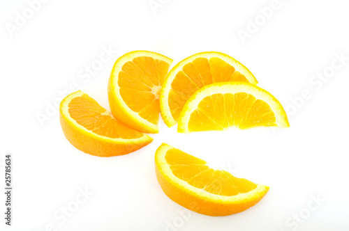 orange slices fanned out isolated on white
