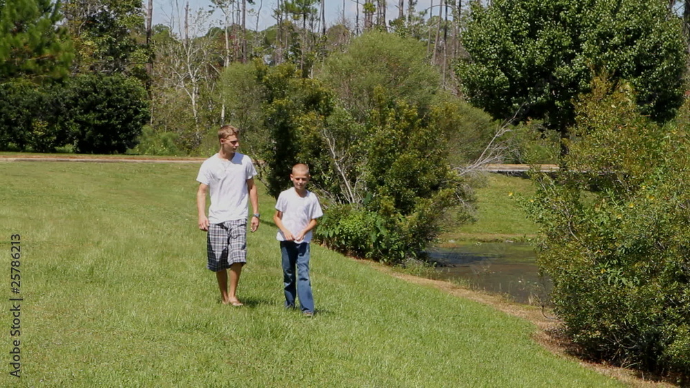 Two Brothers Walk By Pond Two Brothers Walk By Pond