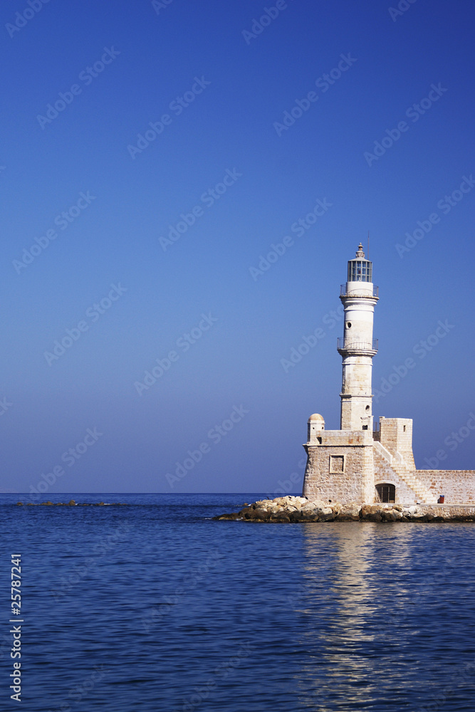 Lonely lighthouse in the sea.