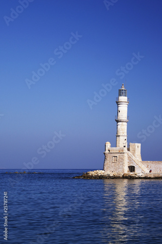 Lonely lighthouse in the sea.