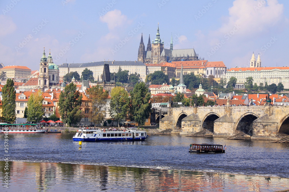 View on the autumn Prague gothic Castle with the Charles Bridge