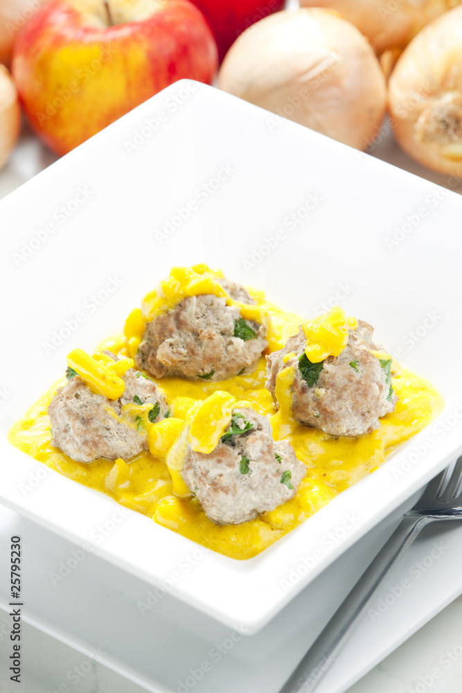 minced meat and herbs balls in apple and curry sauce minced meat and herbs balls in apple and curry sauce