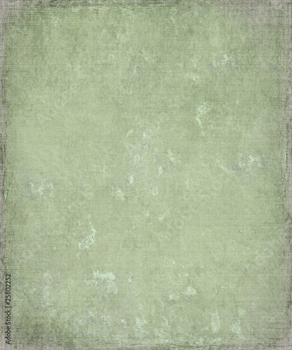 Faded grunge green plaster background with frame