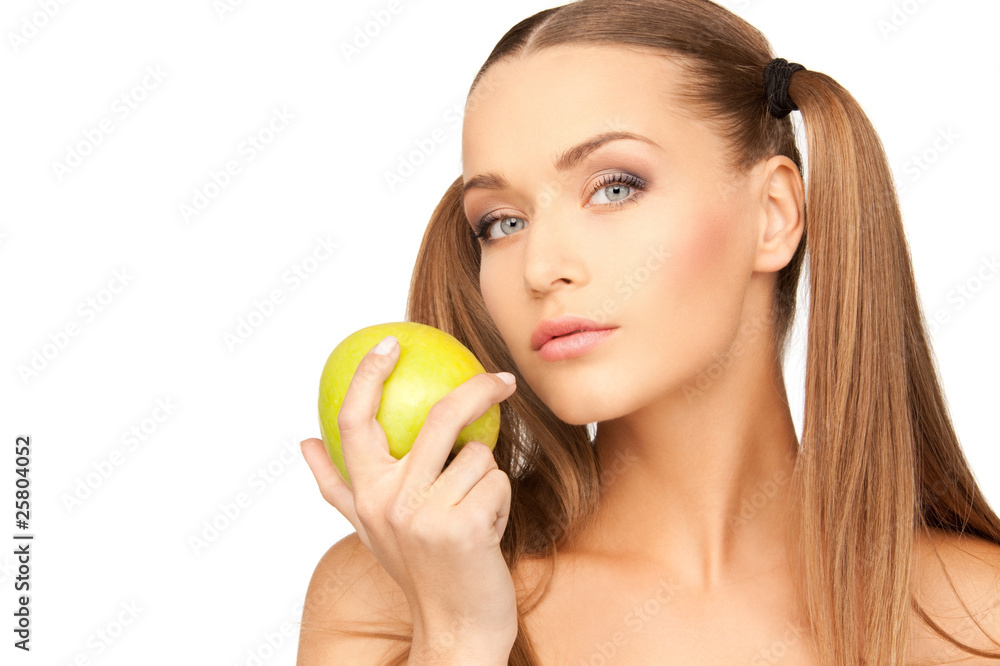 young beautiful woman with green apple young beautiful woman with green apple