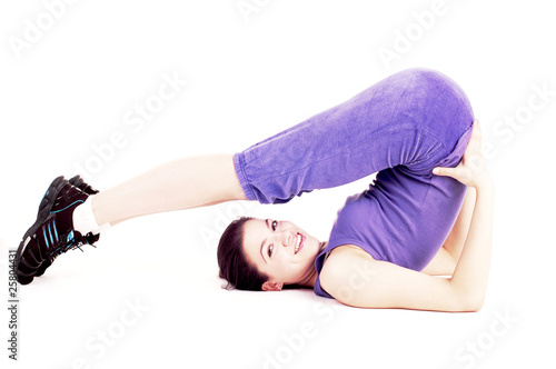 Young pretty girl doing stretching