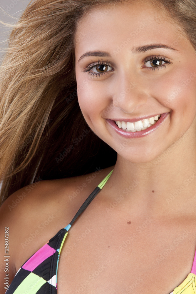 Beautiful young teen girl with pretty hair and bikini. foto de Stock | Adobe Stock