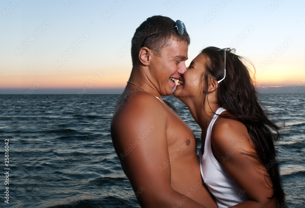 Closeup portrait of happy couple enjoying vacations Closeup portrait of happy couple enjoying vacations