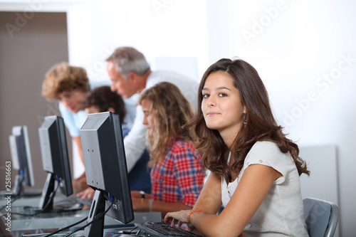 Closeup of young student sitting in class