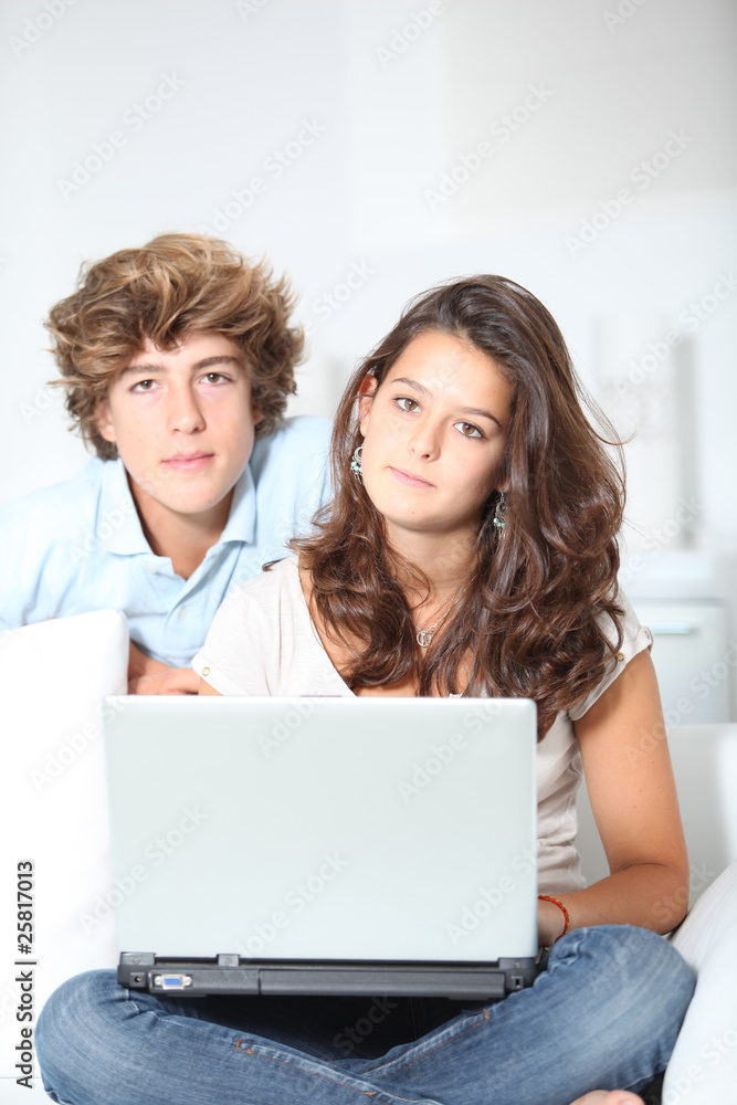 Teenagers with laptop computer Teenagers with laptop computer