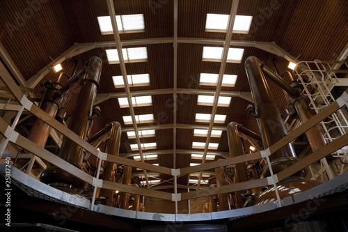 Whisky Distillery interior with stills