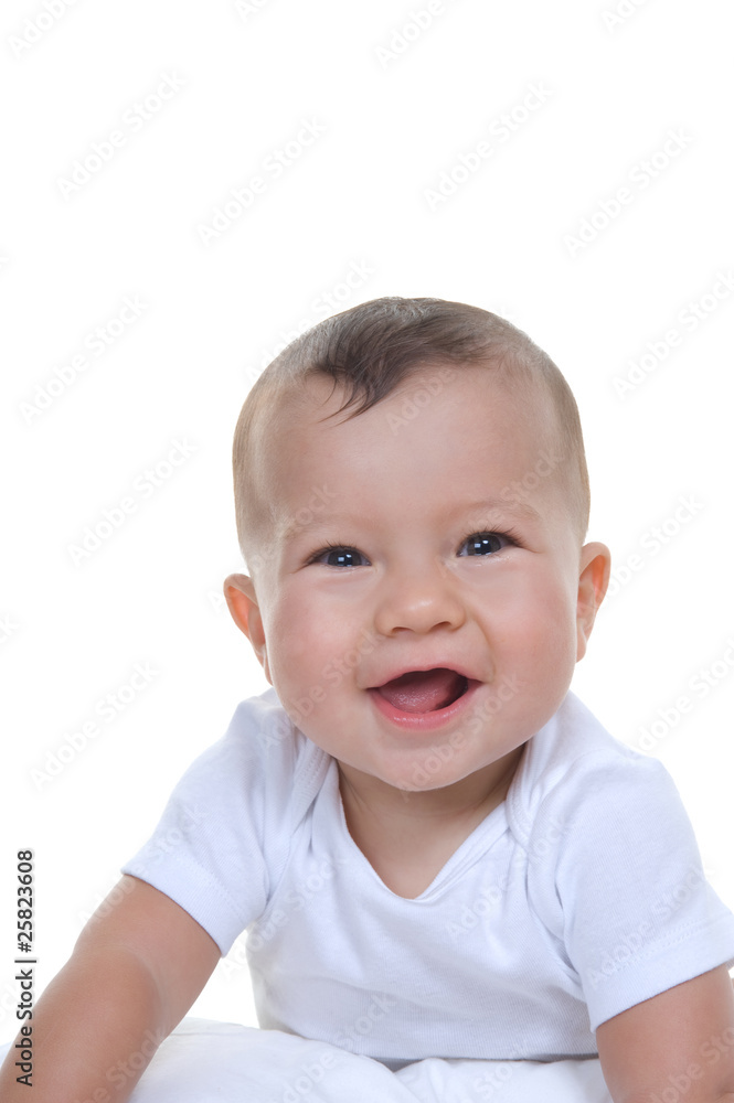 Adorable baby boy smiling in the studio Adorable baby boy smiling in the studio