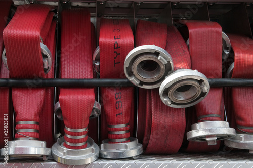 fire hoses in firetruck photo