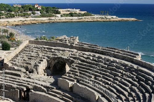 Roman amphitheatre by the sea in Tarragona, Spain photo