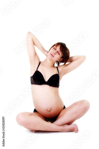 dreaming expectant mother 40 weeks isolated on white © konstantant