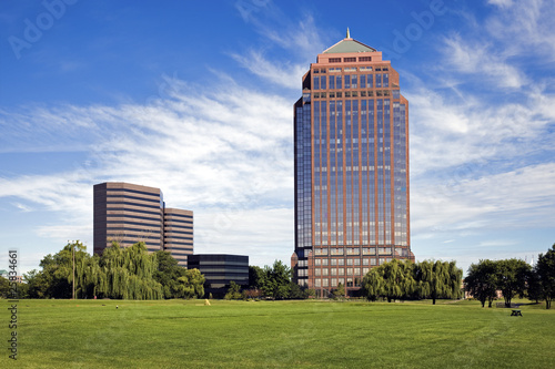 Golf Course in front of skyscrapers photo