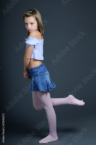 blonde child presenting stocking