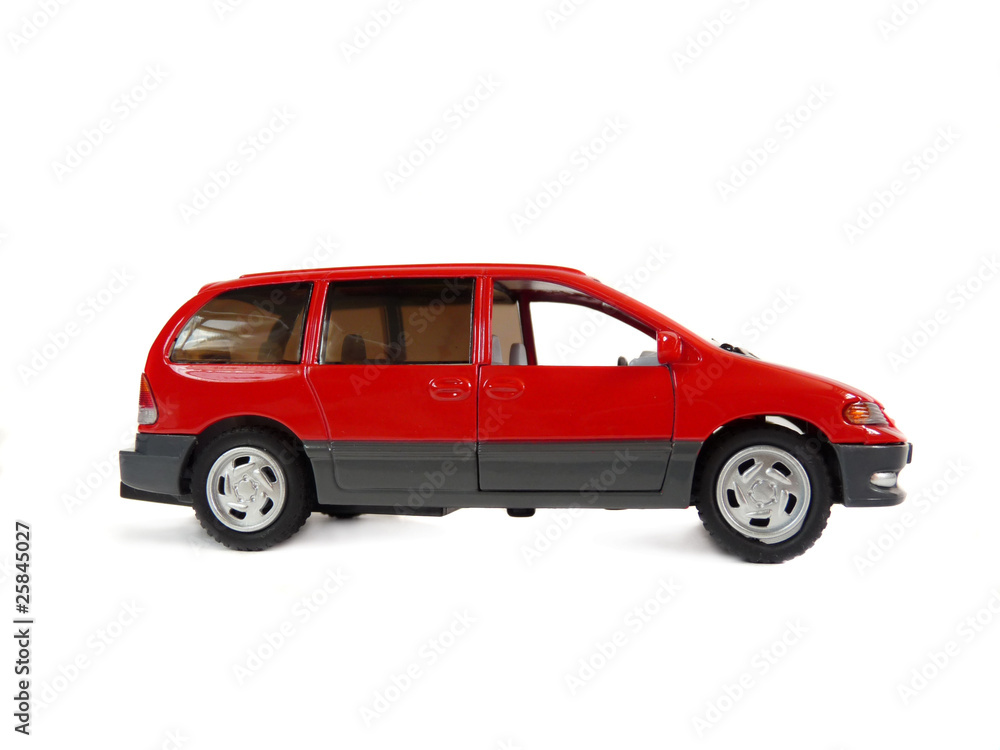 Красный автомобиль, игрушка. вид сбоку.