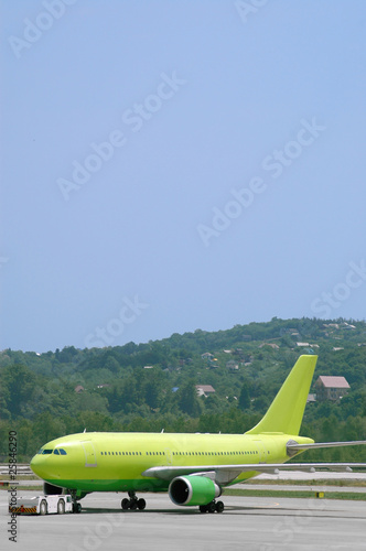 Airplane Being Towed At An Airport