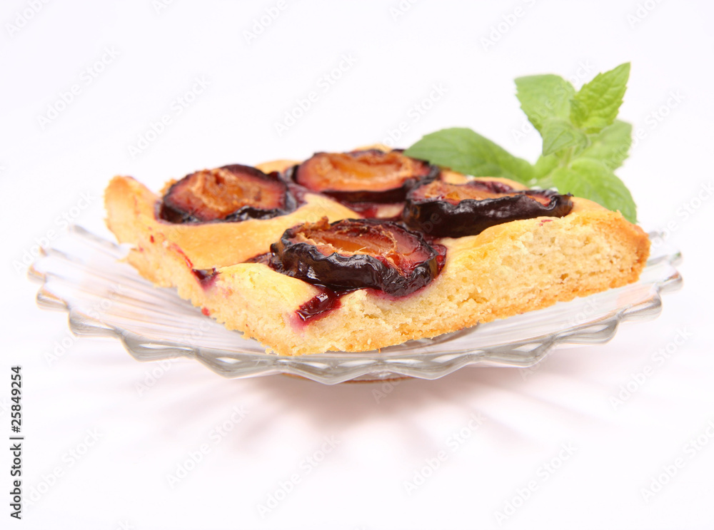 Piece of Plum Pie decorated with a mint twig