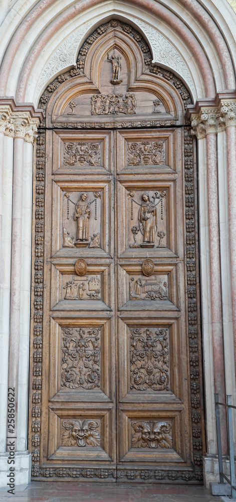 Wooden Portal. St. Francesco Basilica. Assisi. Umbria.