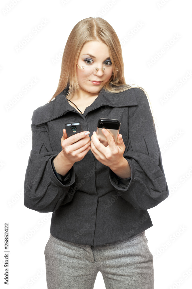 Portrait of surprised young blonde in a gray business suit Portrait of surprised young blonde in a gray business suit