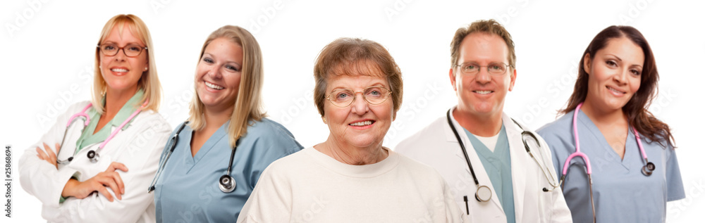 Smiling Senior Woman with Medical Doctors and Nurses Behind Smiling Senior Woman with Medical Doctors and Nurses Behind