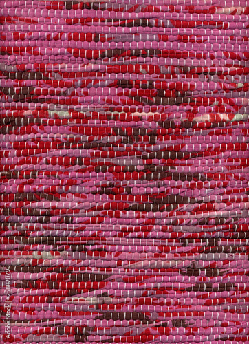 Hand woven pink cotton rug, detail