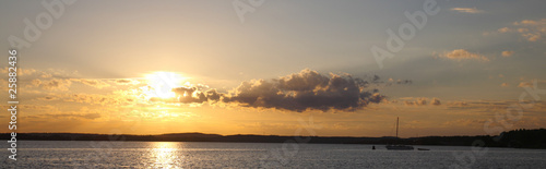 Fototapeta Naklejka Na Ścianę i Meble -  Beautiful landscape with the yacht and the sea on a sunset