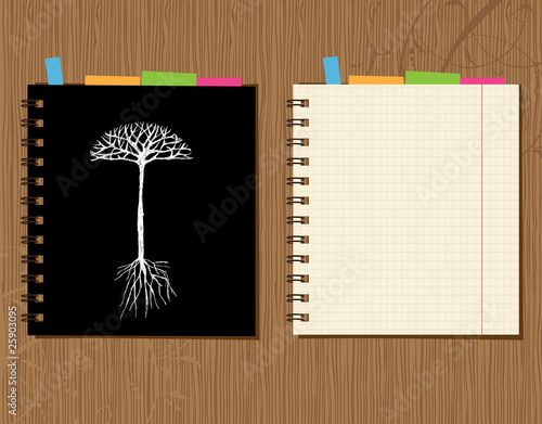Notebook cover and page design on wooden background