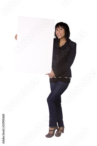 Attractive Woman at Her Desk Holding a Blank Business Card