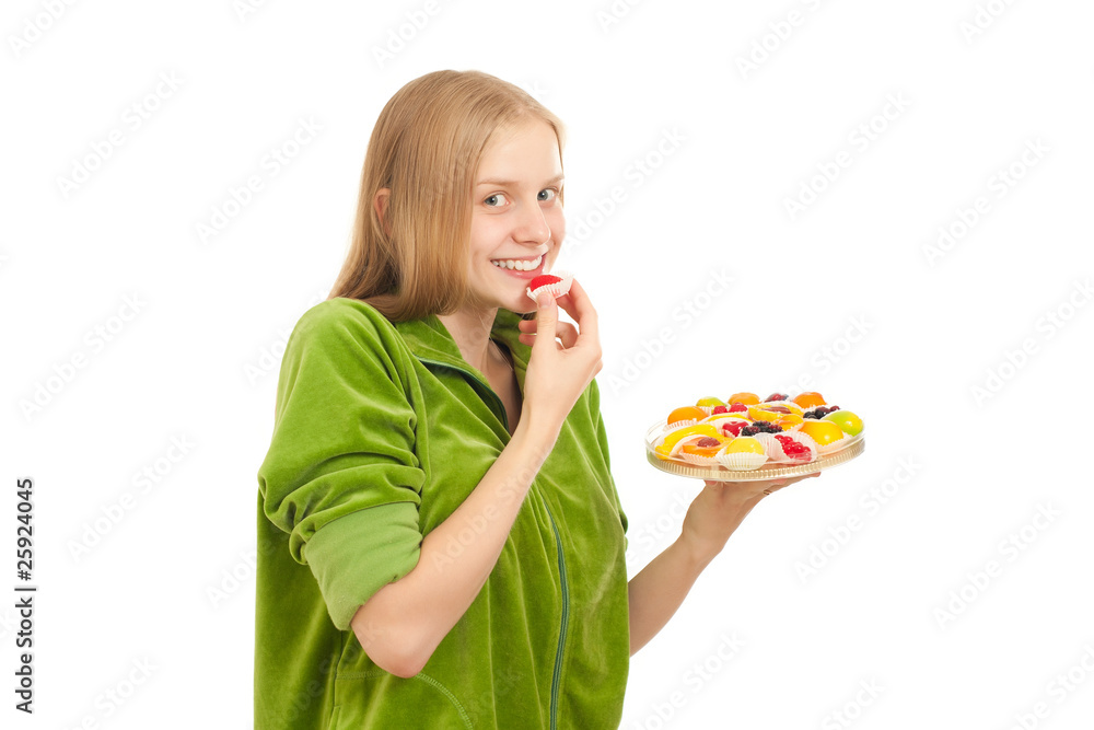 young adorable woman tasting variety of fruits and berries young adorable woman tasting variety of fruits and berries