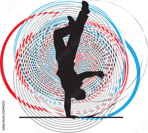 Breakdancer dancing on hand stand silhouette