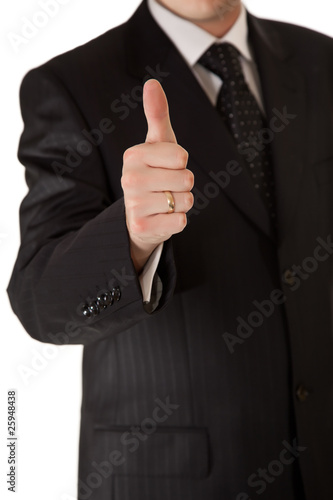 Business man in suit thumbs up on white isolated background © mathom